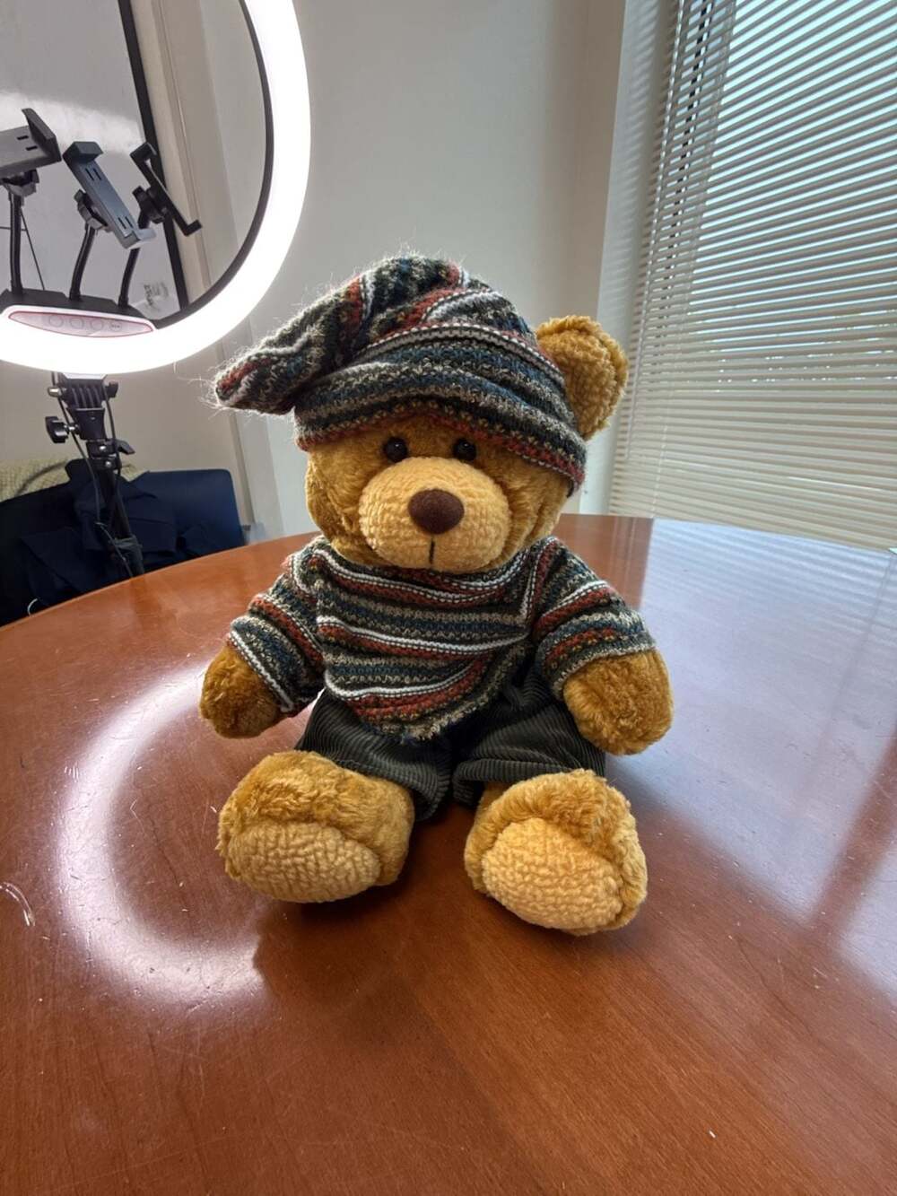 Kuschelmuschel Plush Teddy Bear Wearing Striped Sweater and Hat